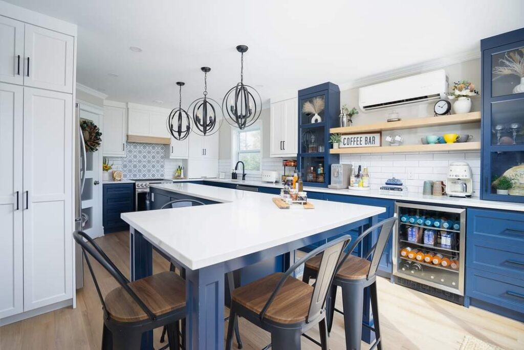 white oak floating shelves and blue shaker cabinets with white shaker cabinets